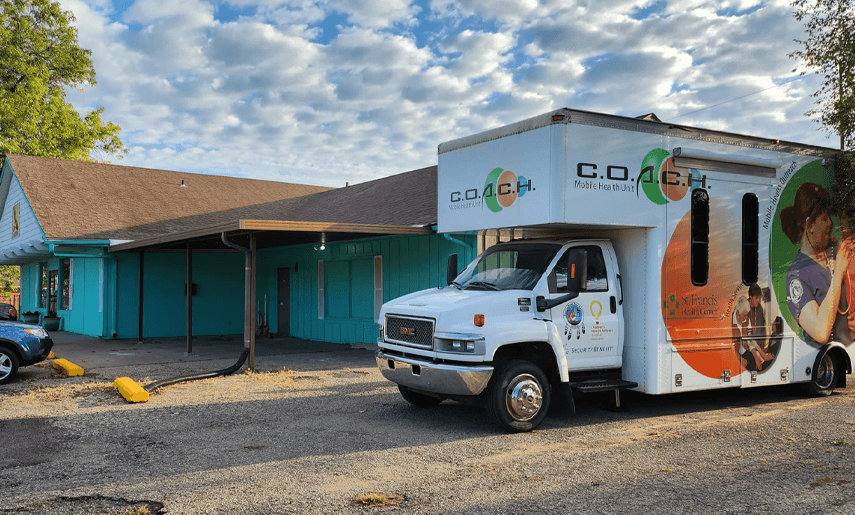 El Centro of Topeka's mobile unit parked at community building in Topeka, KS.